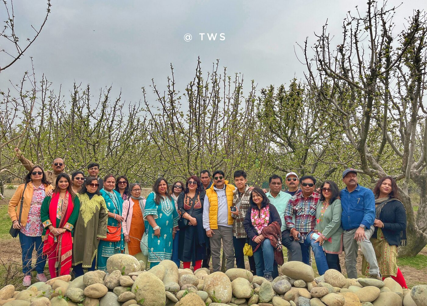 Group in a Kashmir apple orchard